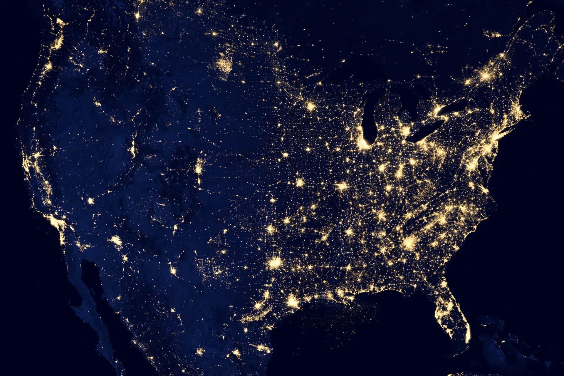 United States at night from space showing interconnected networks